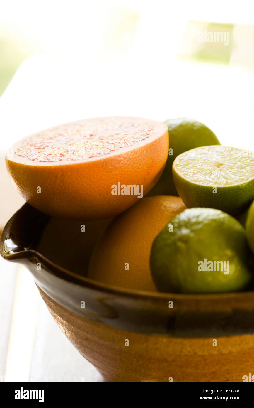 Sliced grapefruit, limes Stock Photo