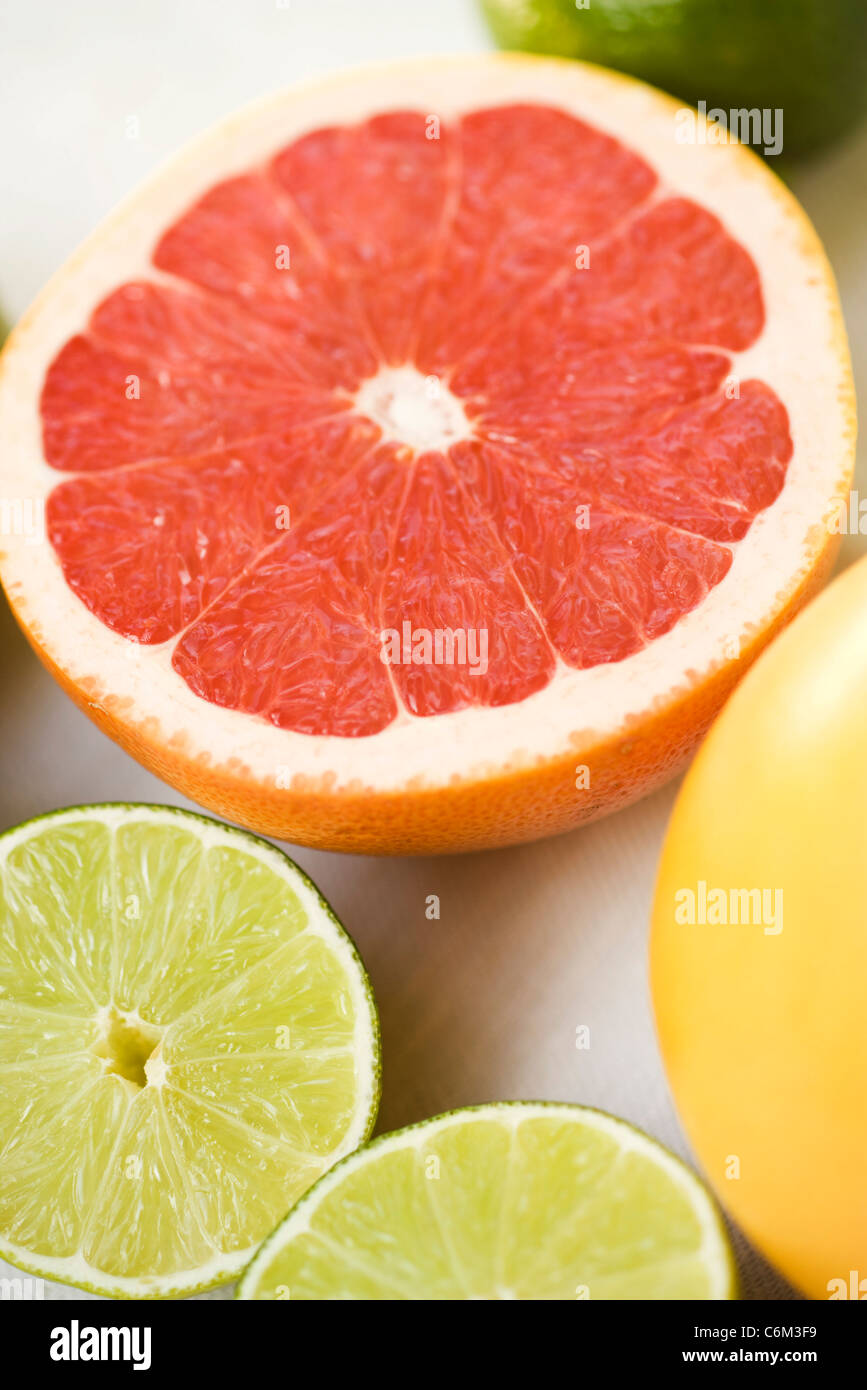 Grapefruit and lime halves Stock Photo