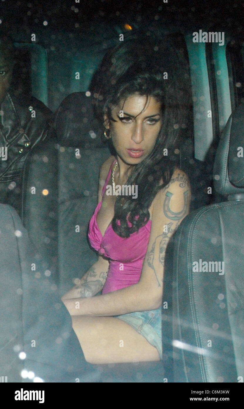 Amy Winehouse, at Kyashii restaurant and bar in Covent Garden where she left at 1.15am to go round the corner to Runway club, Stock Photo
