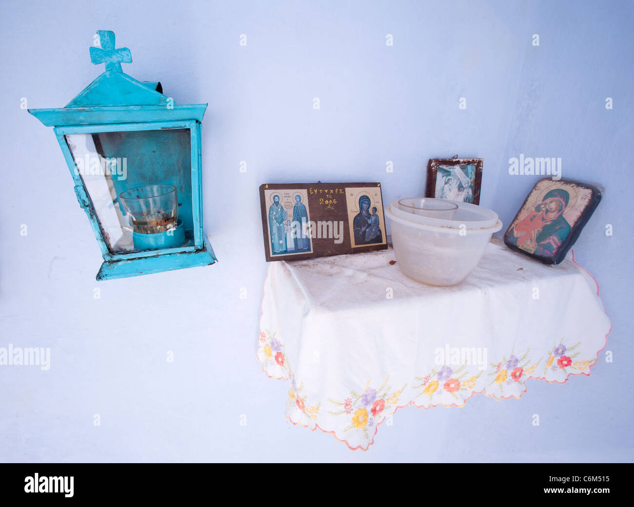 Religious icons, votive offerings, Greek Cyclade island of Tinos. Stock Photo