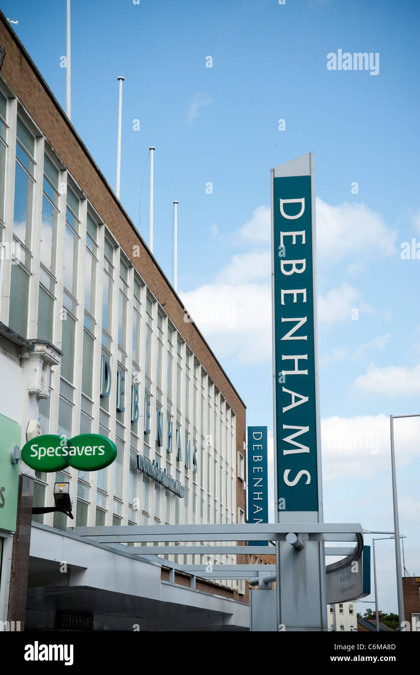 The Debenhams sign in Harrow town centre , September 2011, also a Specsavers sign. Stock Photo