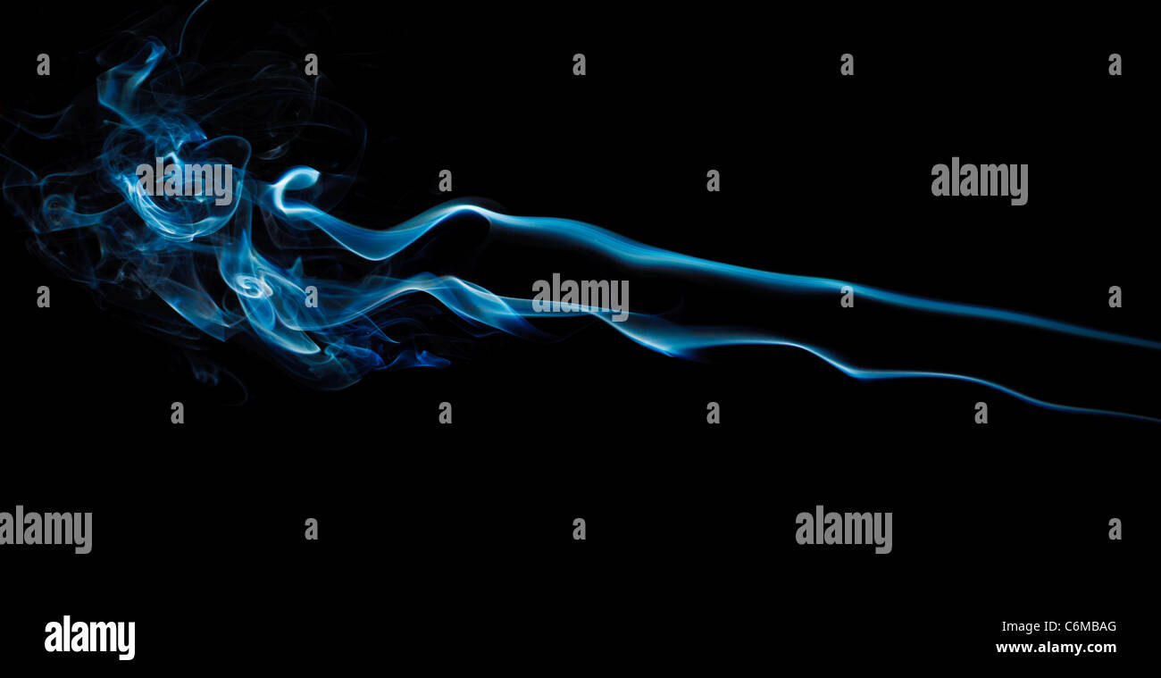 blue abstract smoke pattern on a black background Stock Photo - Alamy