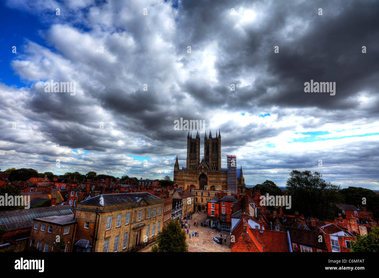 Lincoln city, Lincolnshire dramatic view of the Cathedral from the Castle walls across the square, judges lodgings on left Stock Photo