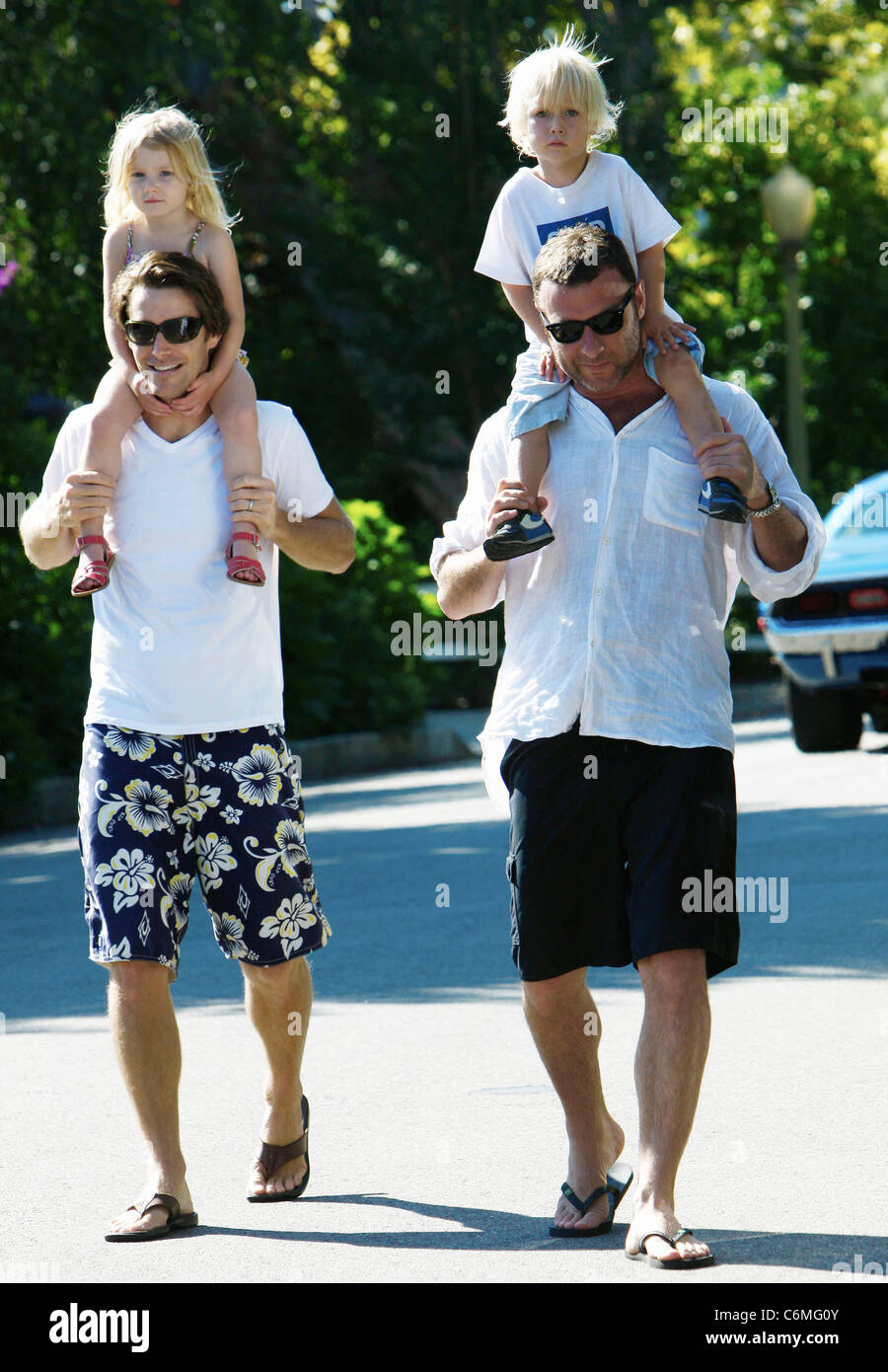 Liev Schreiber out with his son (R) and family friends in Brentwood Los Angeles, USA- 24.07.10 Stock Photo
