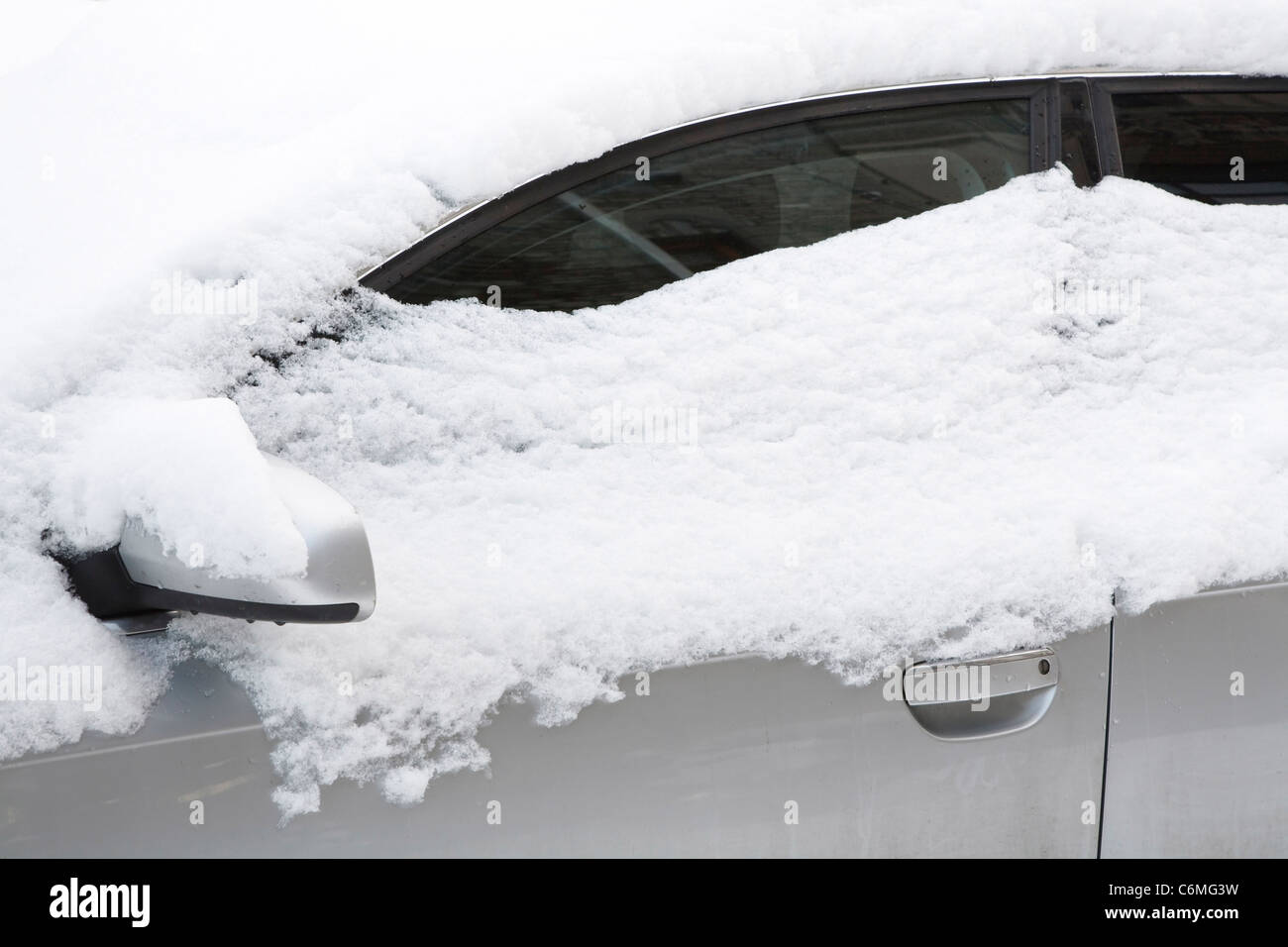 Closeup of a car covered in snow Stock Photo Alamy