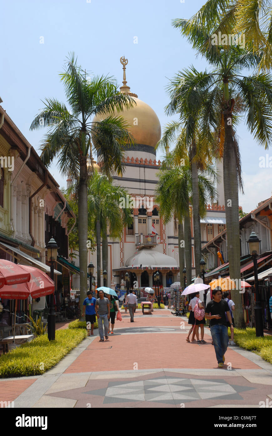 tourists and Masjid Sultan (Sultan Mosque) from pedestrianised Bussorah Street (off Muscat Street) ,Singapore Stock Photo