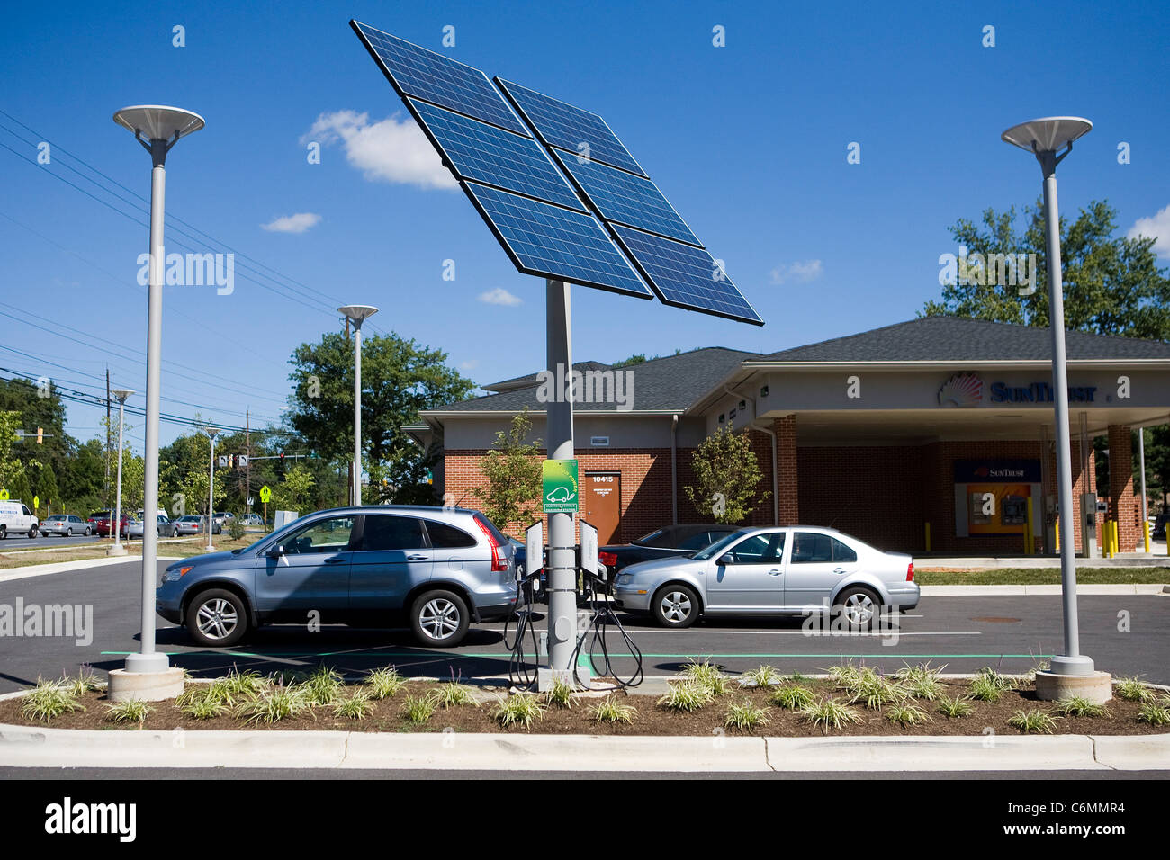 A solar powered electric car charger.  Stock Photo