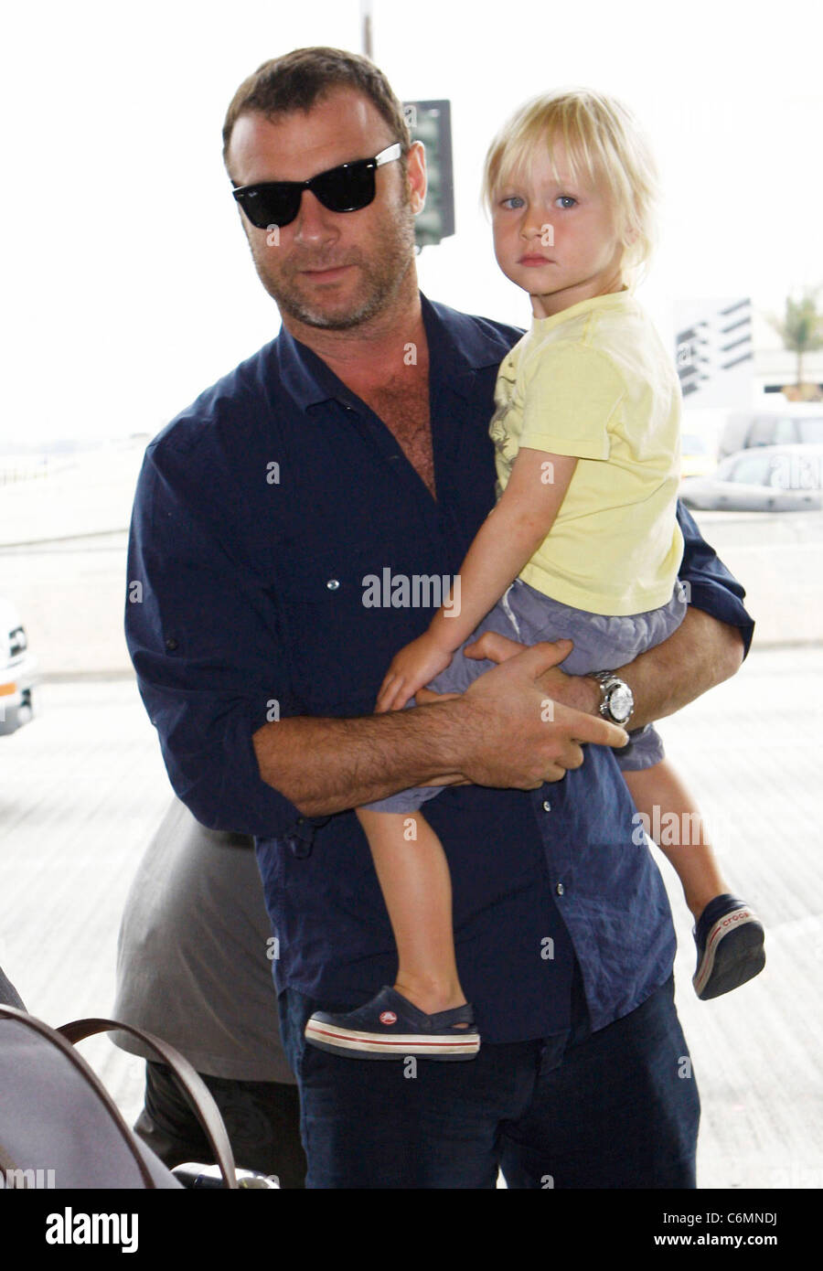 Liev Schreiber and his son Alexander 'Sasha' Pete Schreiber outside LAX Los Angeles, USA - 25.07.10 Stock Photo