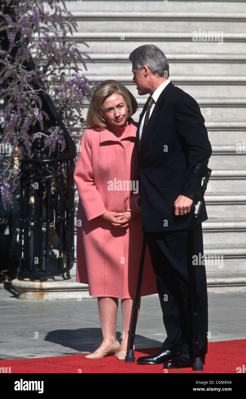 President Bill Clinton crutches braces Hillary First Lady pink coat arrival ceremony State Visit
