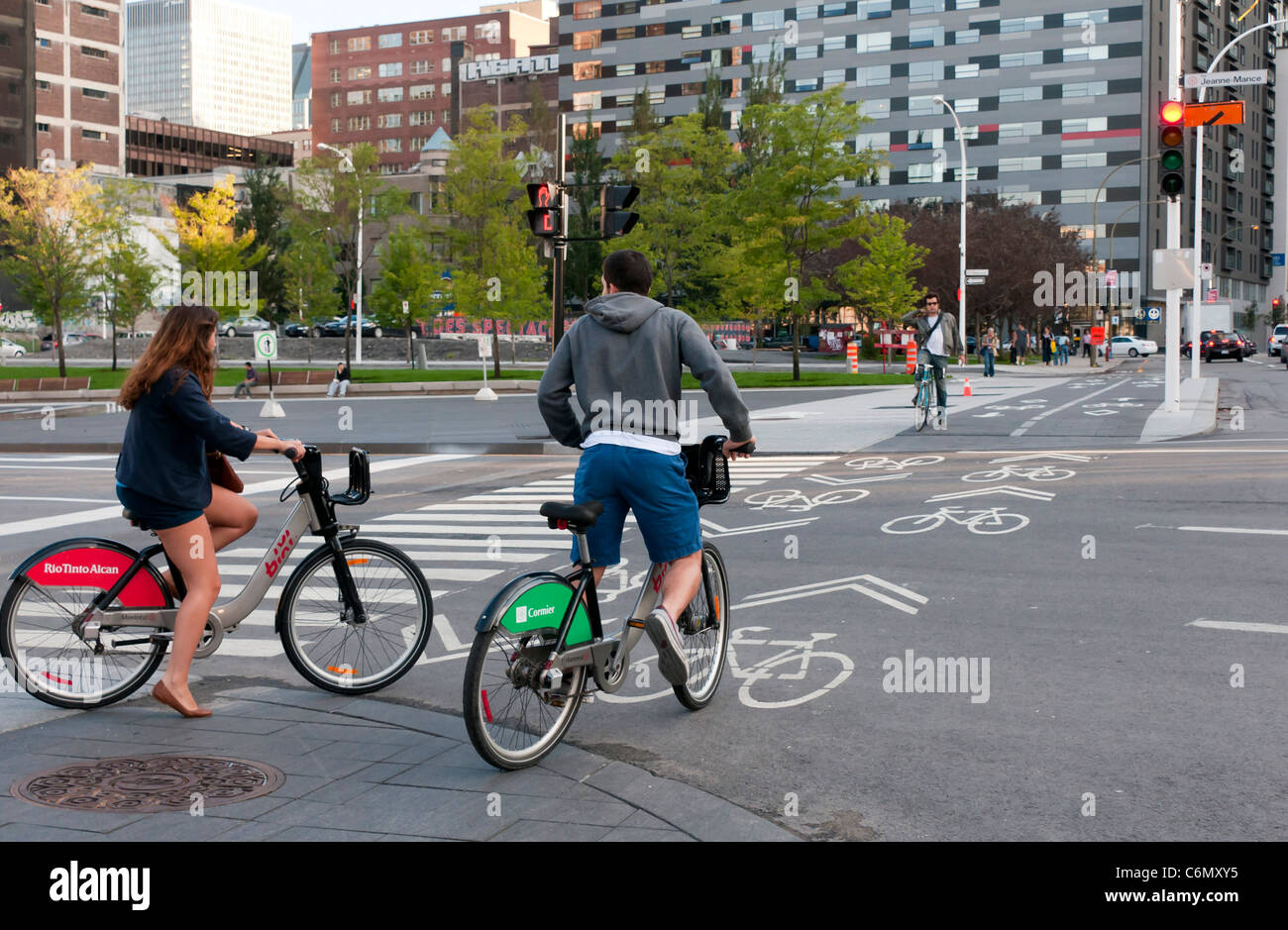 People enjoying ride on Bixi bikes downtown Montreal CanadaBixi is a