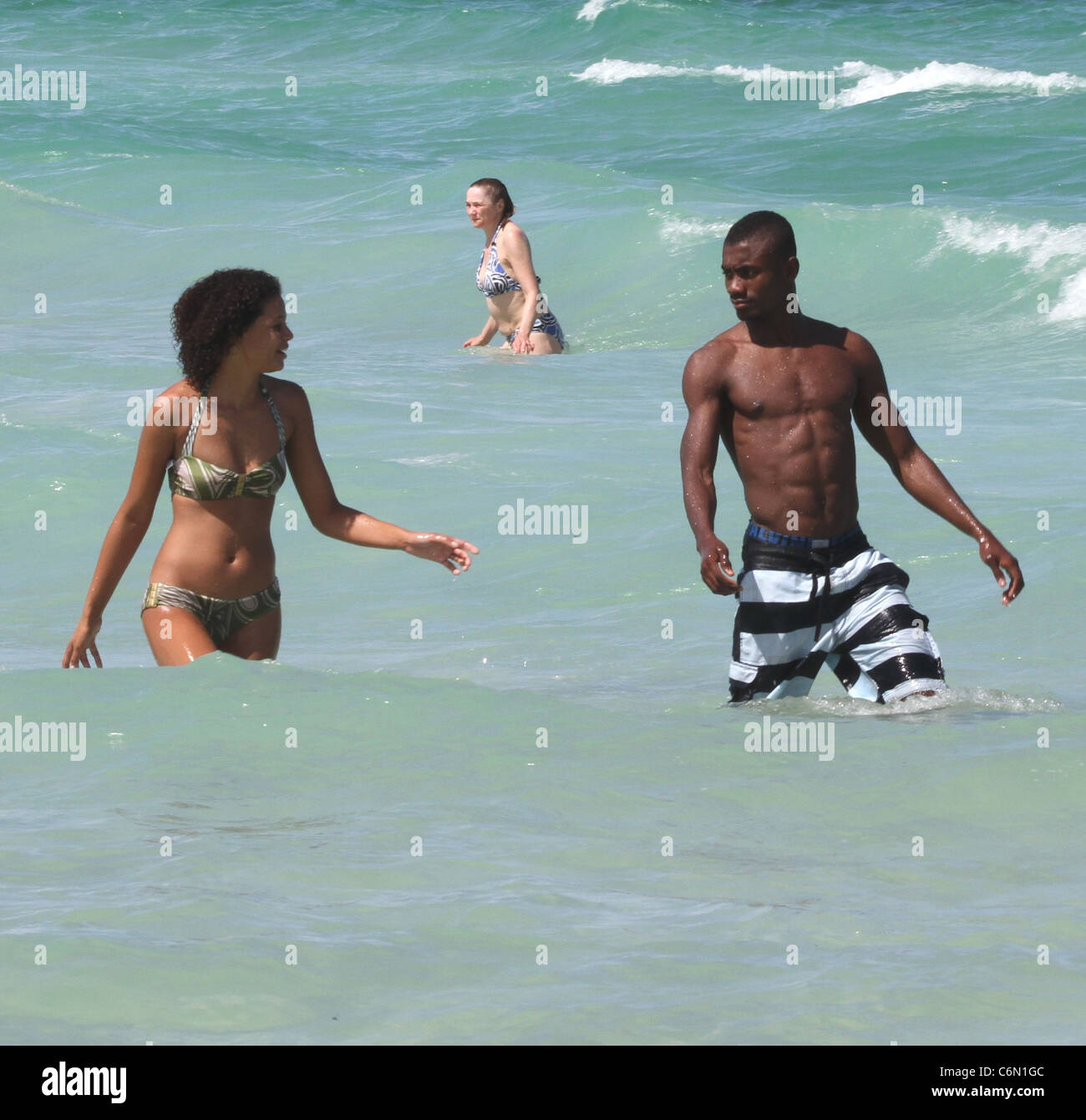 Chelsea footballer Salomon Kalou and girlfriend Anedie Azael spend the day  in the sea while enjoying a beach break Miami Beach Stock Photo - Alamy