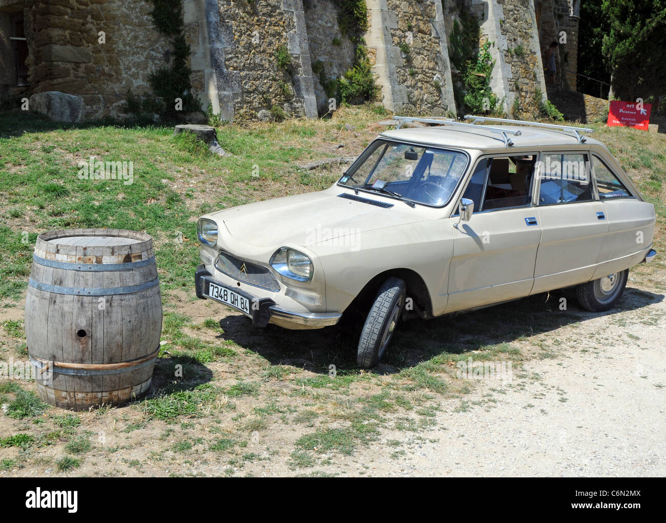 Old Citroen Ami 8 in front of Château de Lourmarin - Castle in Lourmarin town, Vaucluse department, Provence region in France Stock Photo