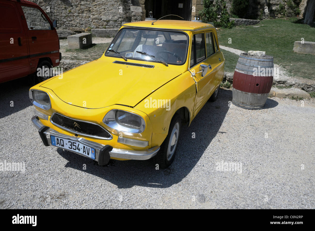 Old Citroen Ami 8 in front of Château de Lourmarin - Castle in Lourmarin town, Vaucluse department, Provence region in France Stock Photo