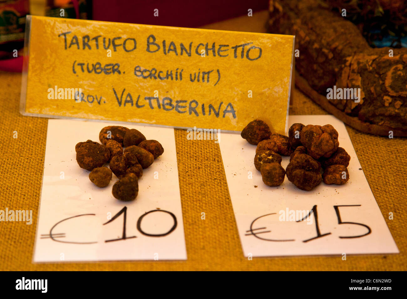 Tartufo Bianchetto (truffles) displayed for sale at a market in