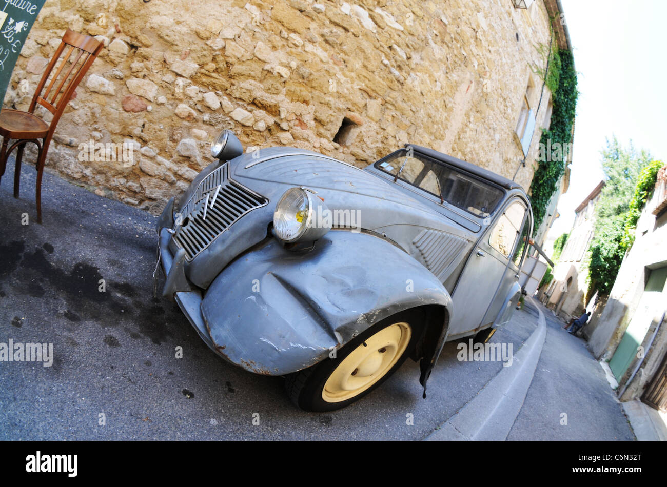 old Citroen 2cv model AZL from 1957 in Lourmarin town, Vaucluse department in Provence region, France Stock Photo