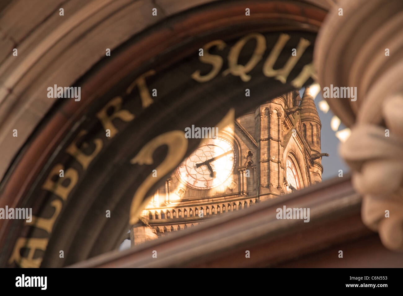 Reflection of Manchester Town Hall clock tower, Albert Square