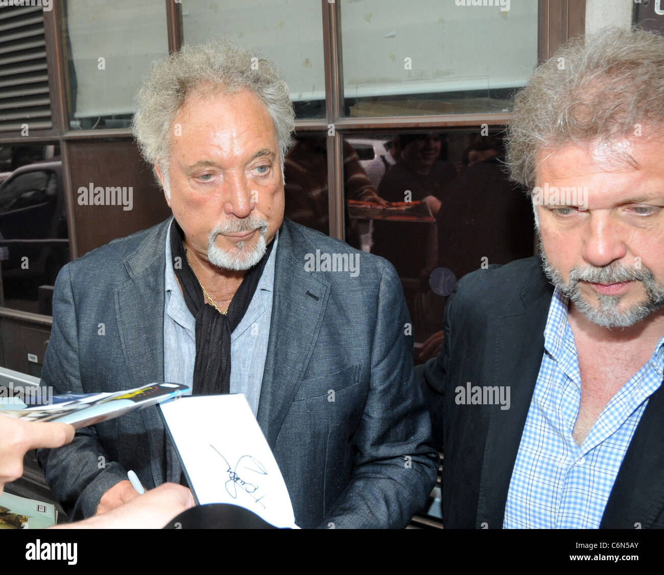 Tom Jones and his son Mark Woodward outside the BBC Radio One studios  London, England - 27.07.10 Stock Photo - Alamy