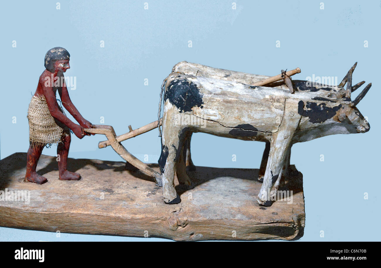 935. WOODEN MODEL OF PLOWWING WITH A PAIR OF OXEN, SECOND MILLENNIUM B.C. Stock Photo