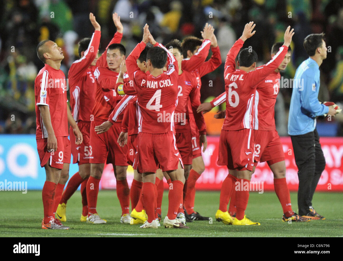 The North Korean players applaud their supporters 2010 FIFA World Cup