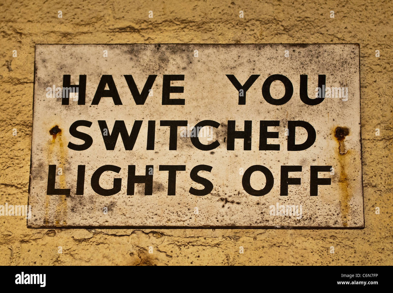 Old metal sign Have You Switched Lights Off Stock Photo Alamy