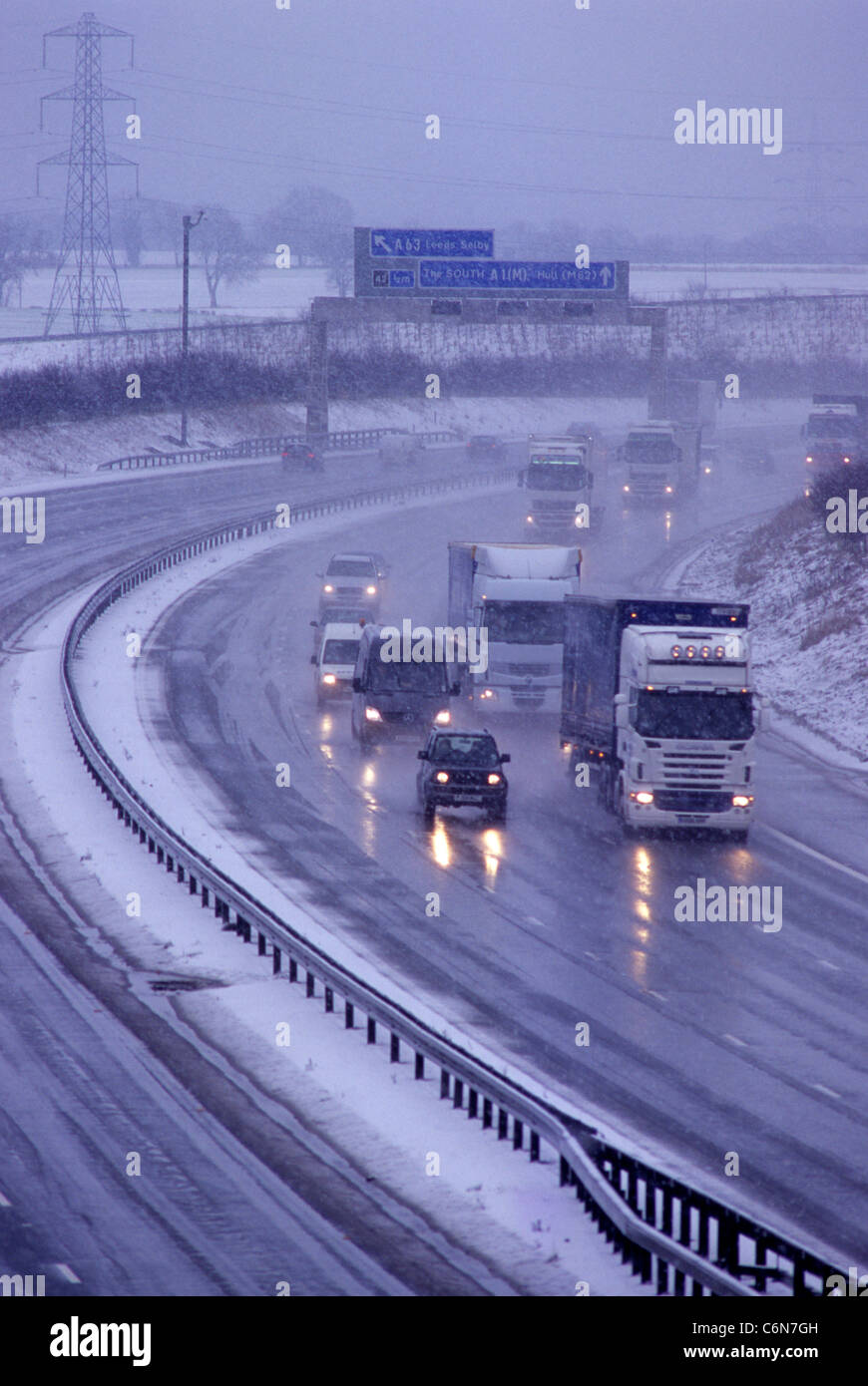 heavy traffic struggling through blizzard winter conditions on a1/m