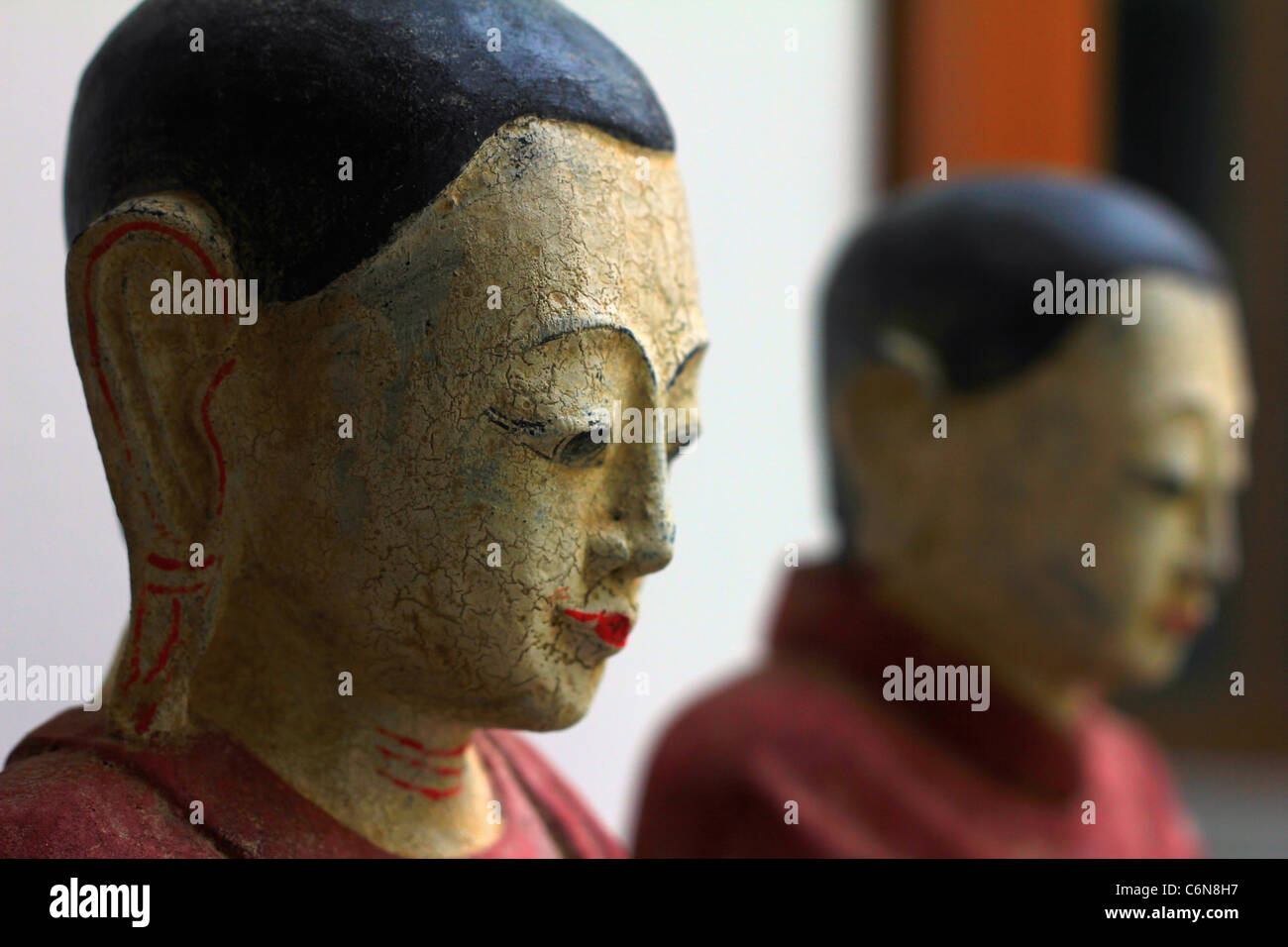 Wooden Thai Statues of Buddhist Monks Stock Photo Alamy