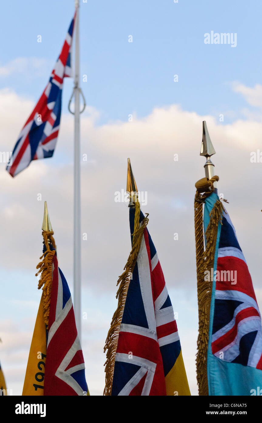 Royal British Legion flags and standards in front of a Union Flag Stock Photo