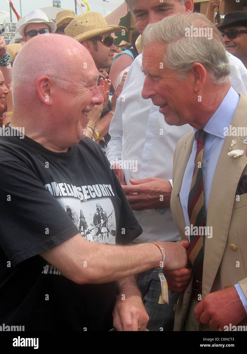 Prince Charles, Prince of Wales meets festival goers during a visit to