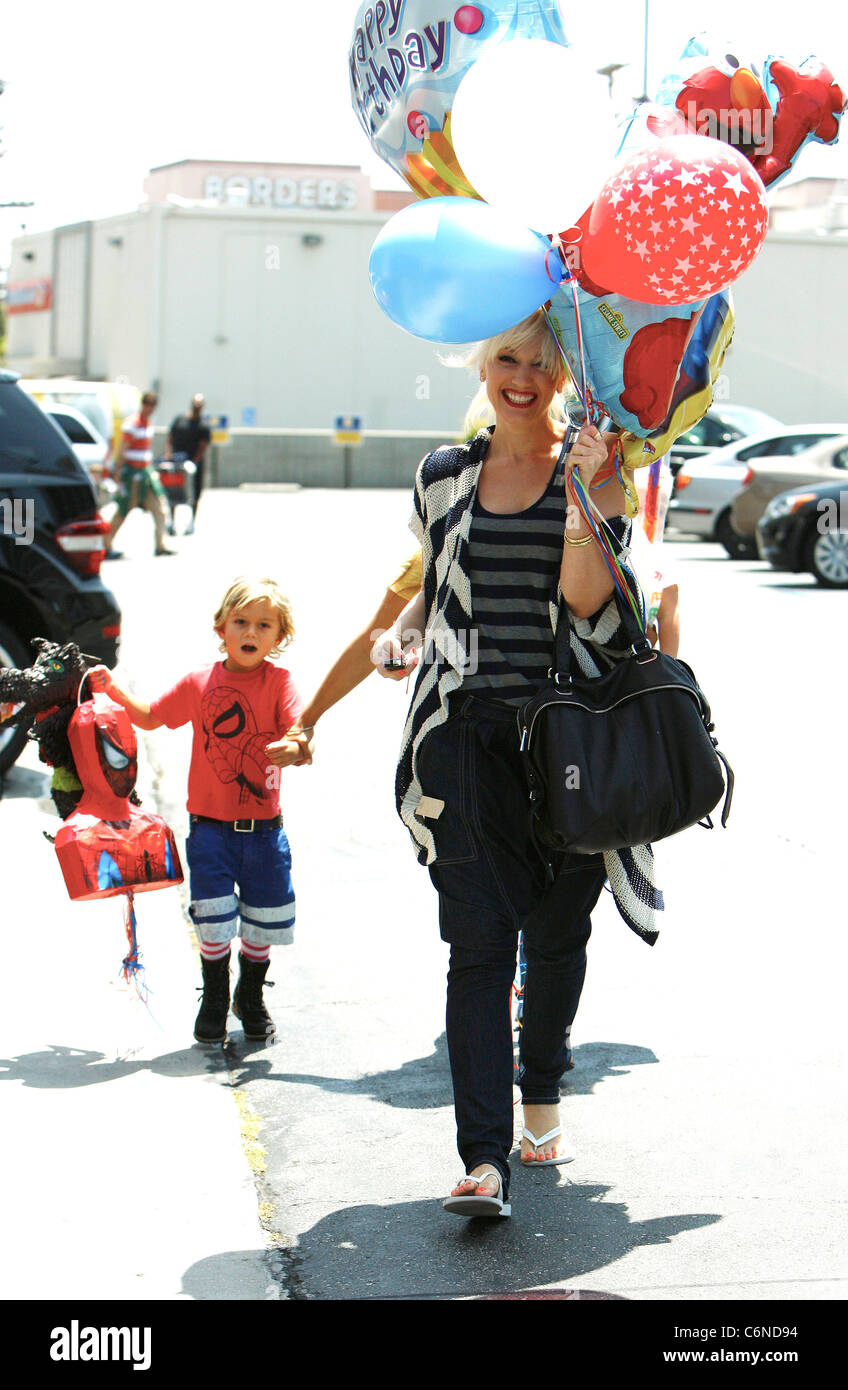 Gwen Stefani shopping at Party City in Hollywood with family holding a(00)
