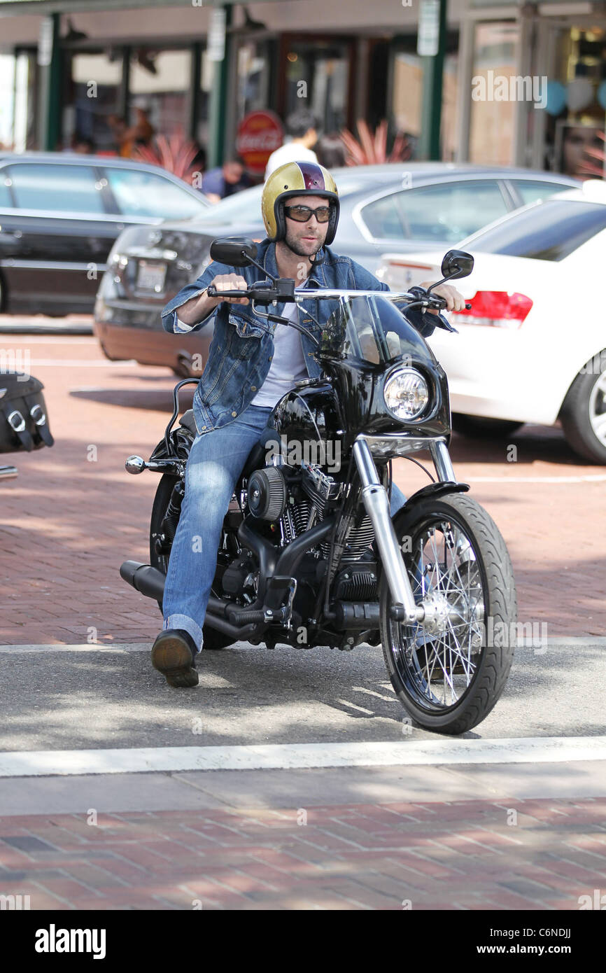 Adam Levine out and about on his motorcycle at Malibu Country Mart in  Malibu on July 4th - Independence Day Malibu, USA Stock Photo - Alamy