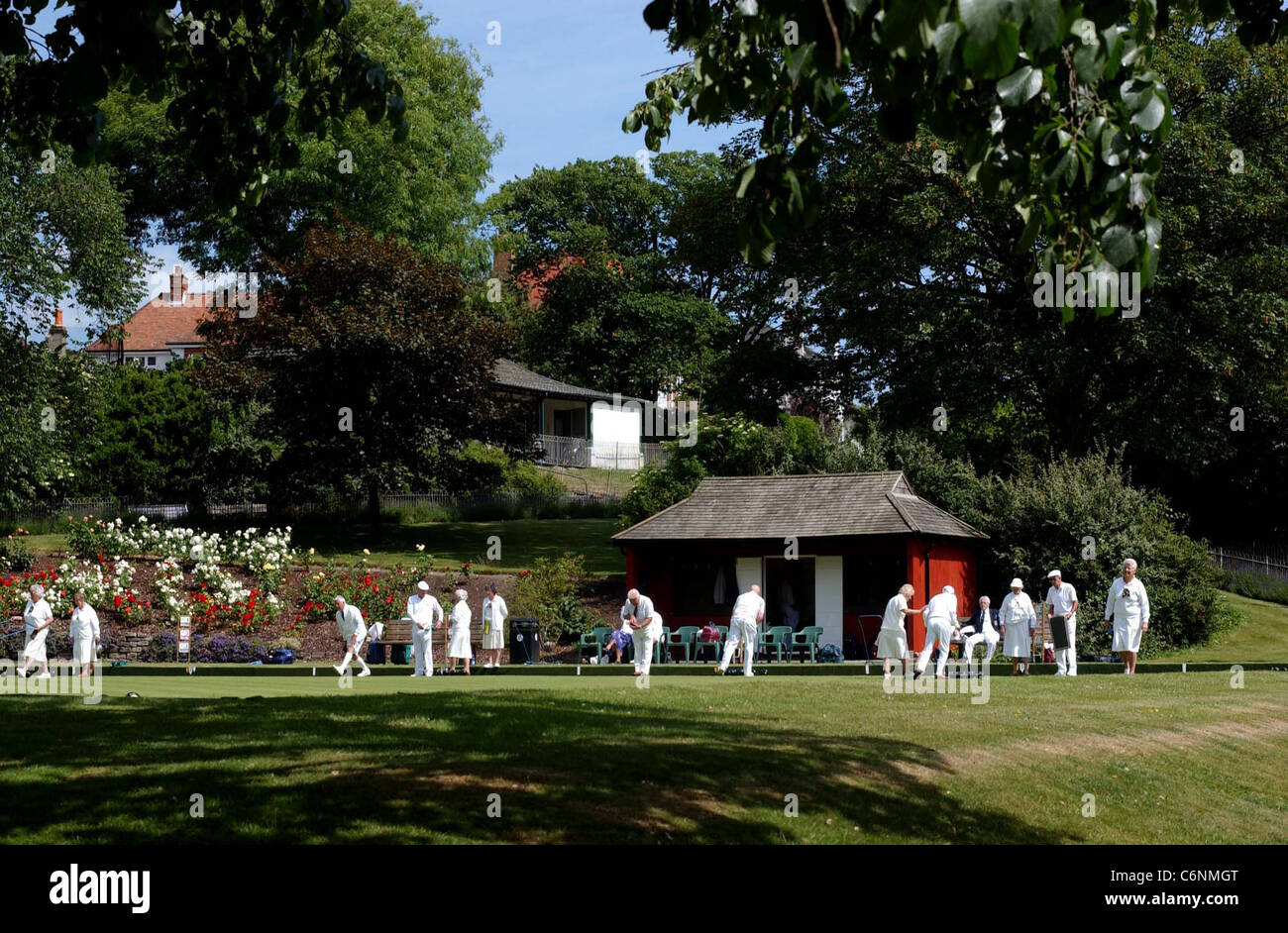 A traditional English scene as bowlers enjoy a match on the Queens Park bowling greens in Brighton Stock Photo