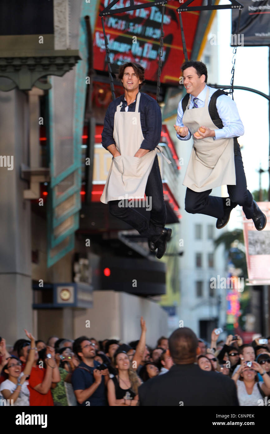 Tom Cruise And Jimmy Kimmel Hanging On A Harness Outside El
