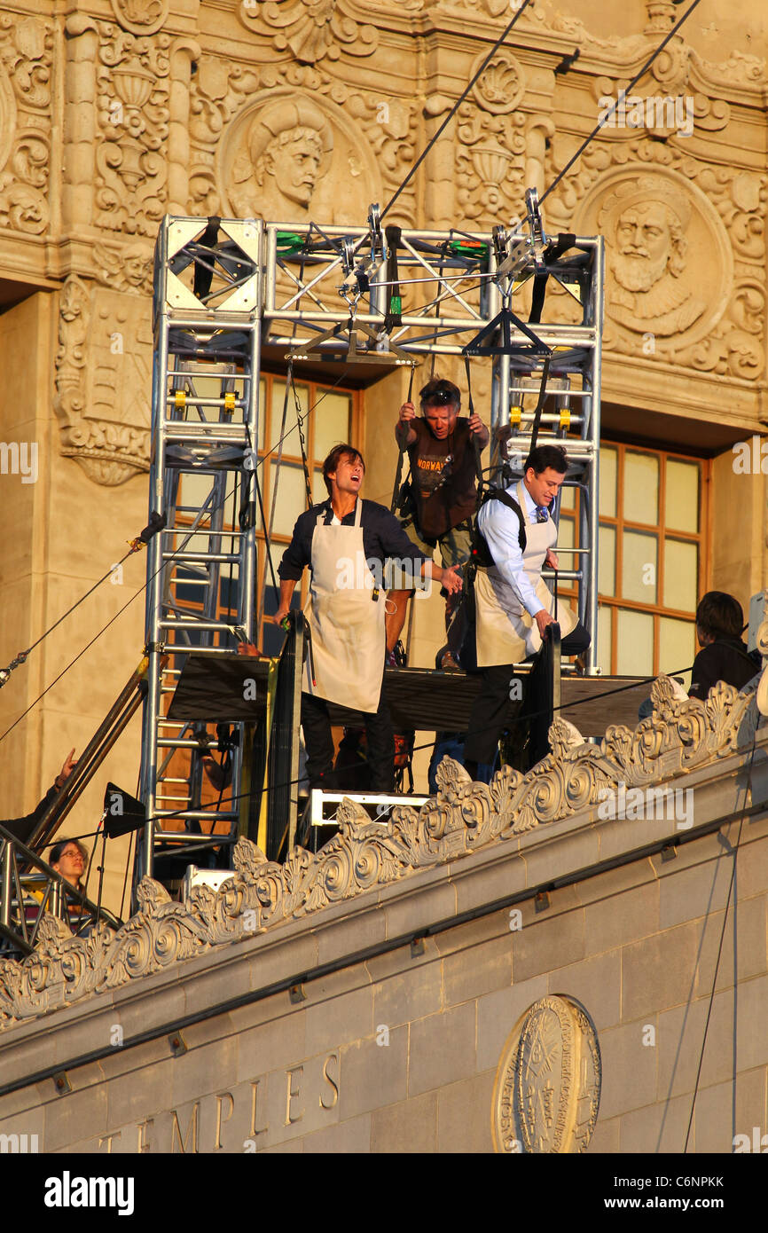 Tom Cruise And Jimmy Kimmel Hanging On A Harness Outside El