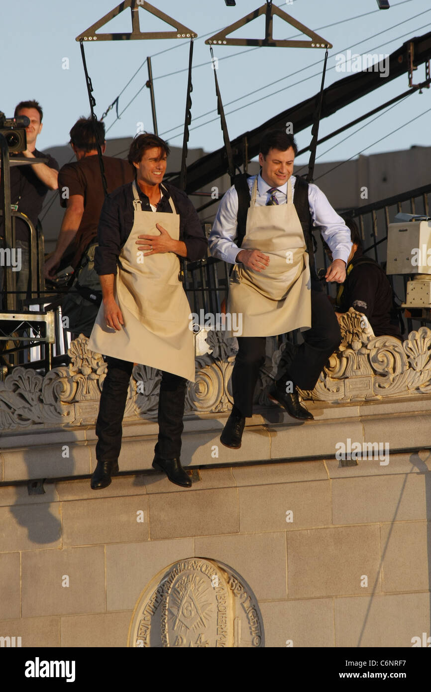 Tom Cruise And Jimmy Kimmel Hanging On A Harness Outside El