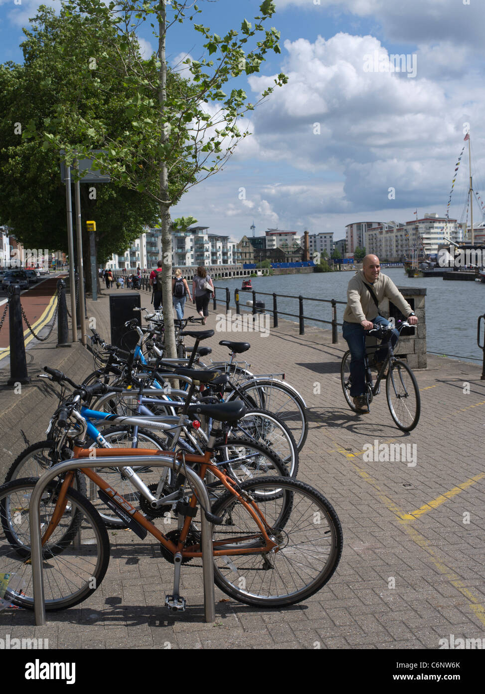 dh City cycle path BRISTOL DOCKS BRISTOL Bicycle rack parking cyclist bike cycling uk man riding