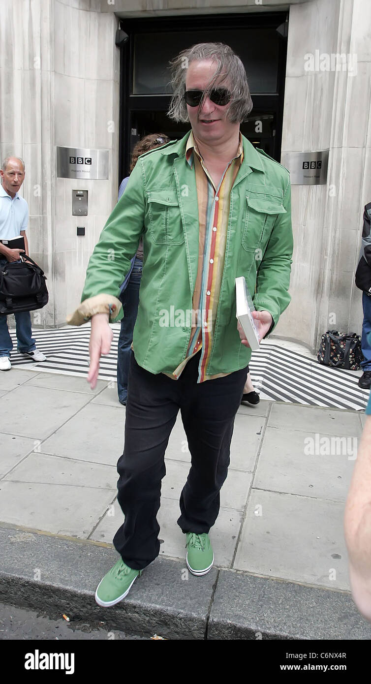 REM guitarist Peter Buck leaving the BBC Radio Two studios where he was