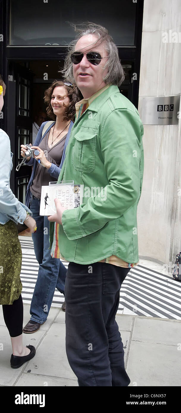 REM guitarist Peter Buck leaving the BBC Radio Two studios where he was