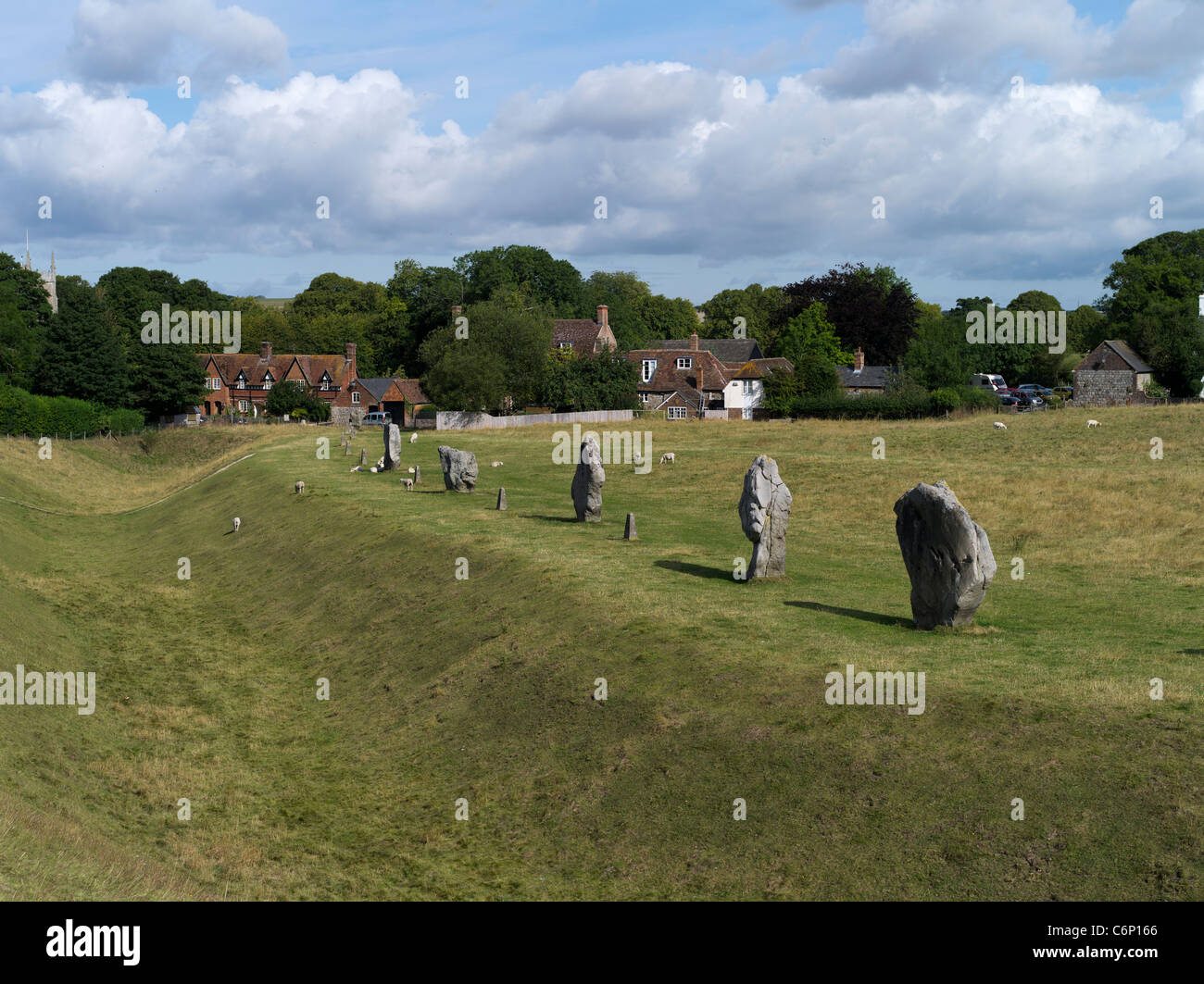 dh Avebury Stone Circle AVEBURY WILTSHIRE Earthworks ditch henge standing stones circle at village houses neolithic monument site uk Stock Photo