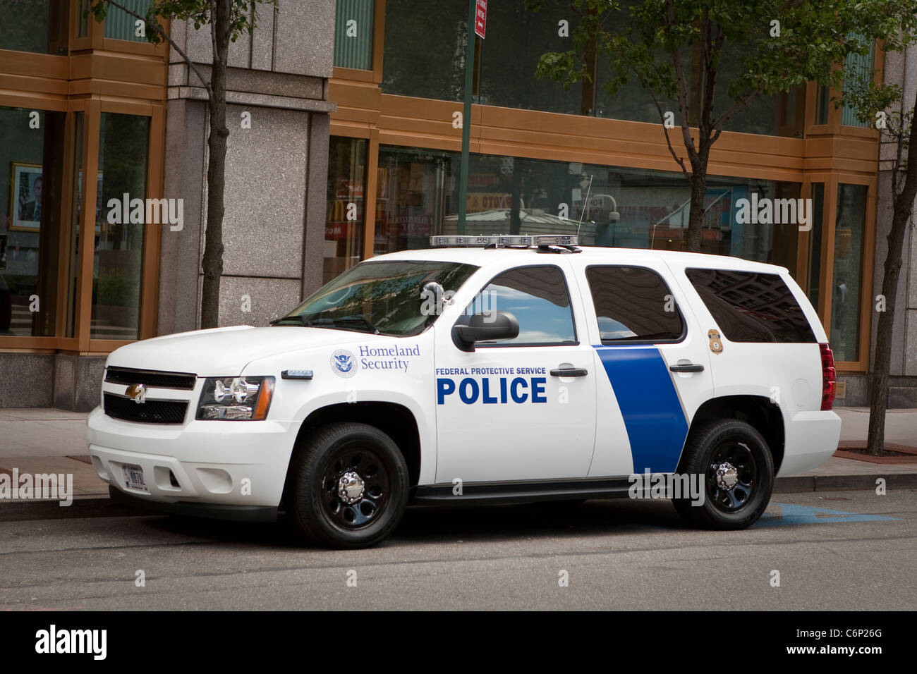 A Homeland Security police car of the Federal Protective Service is parked by the Jacob K. Javits Federal Building in New York Stock Photo