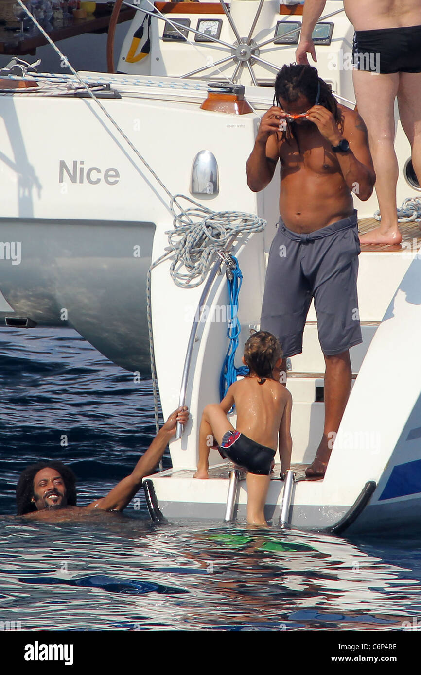 Yannick Noah and son Joalukas Former tennis star Yannick Noah, holidaying  on his yacht with family and friends Stock Photo - Alamy