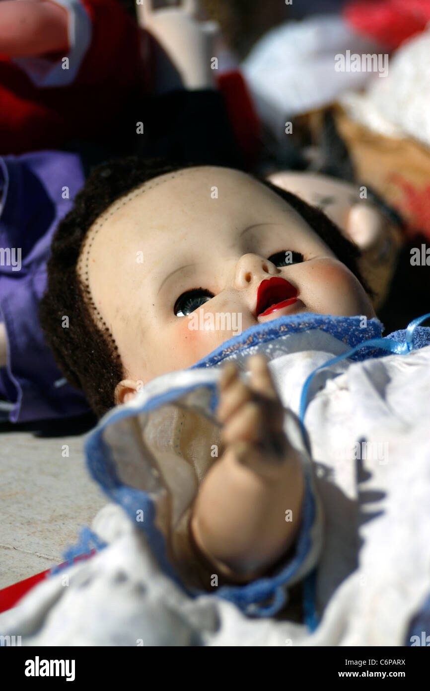 Doll for sale at flea market Stock Photo