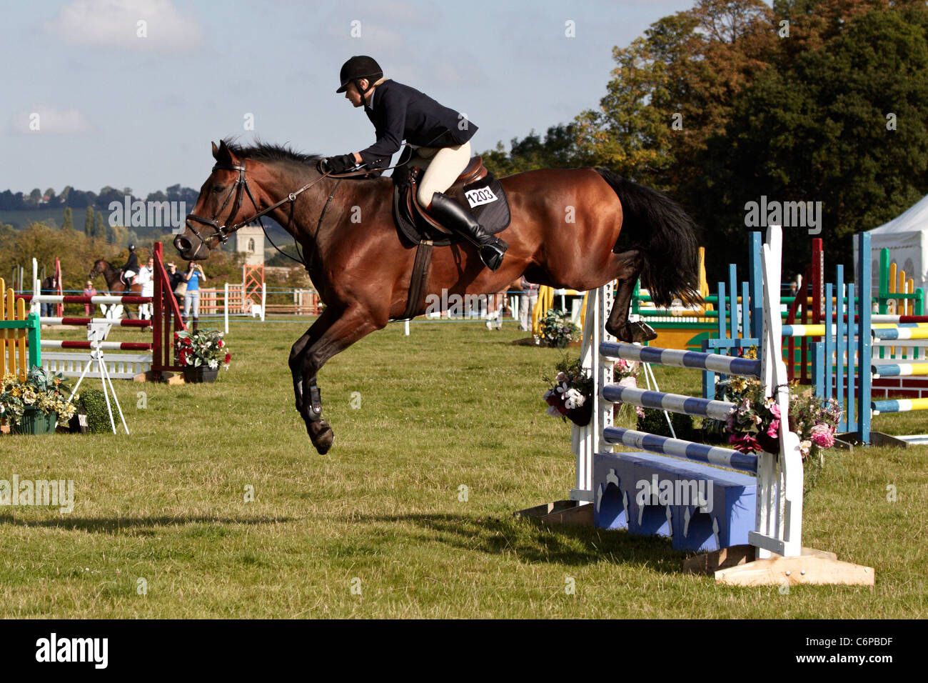 A competitor in the show jumping event at the Bucks County Show 2011. Stock Photo