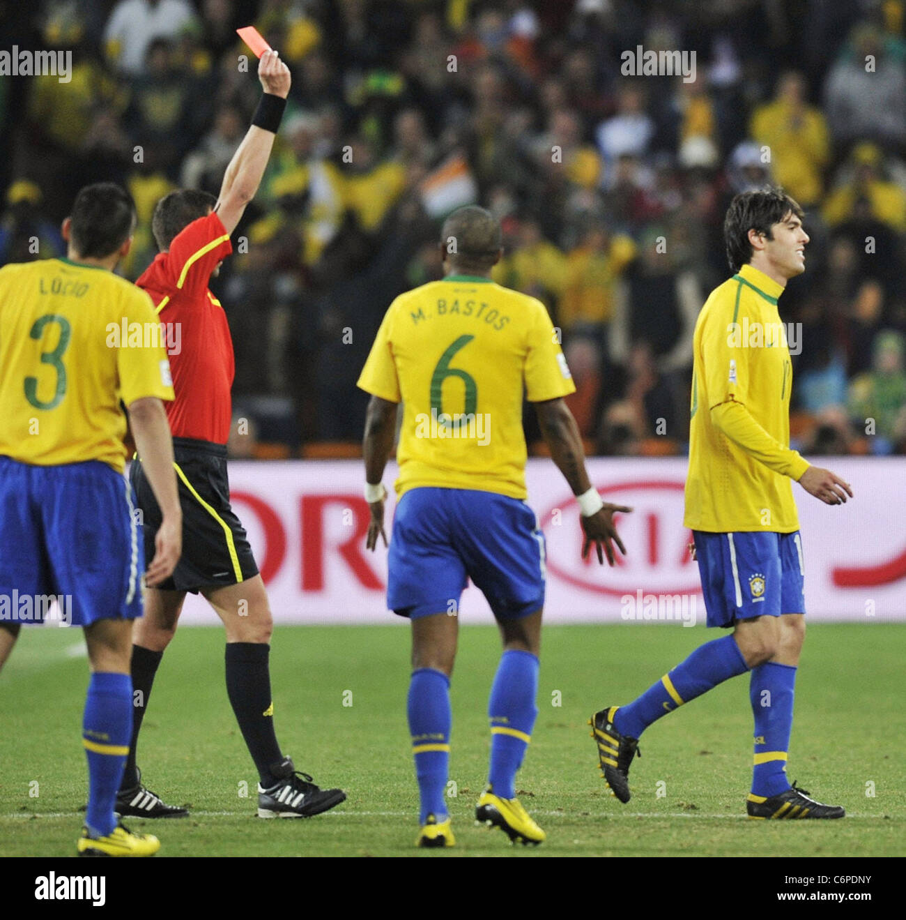 Brazil midfielder Kaka (R) is shown a red card 2010 FIFA World Cup ...
