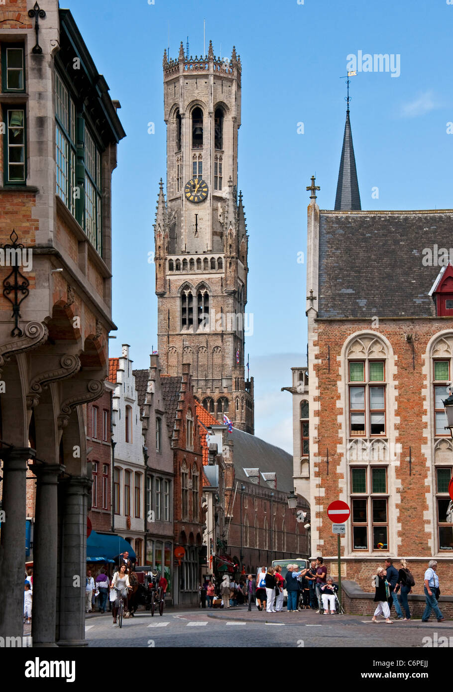 Medieval architecture of Bruges (Brugge) is dominated by the Belfort (belfry tower) as seen from corner of Dijver and Wollestra Stock Photo