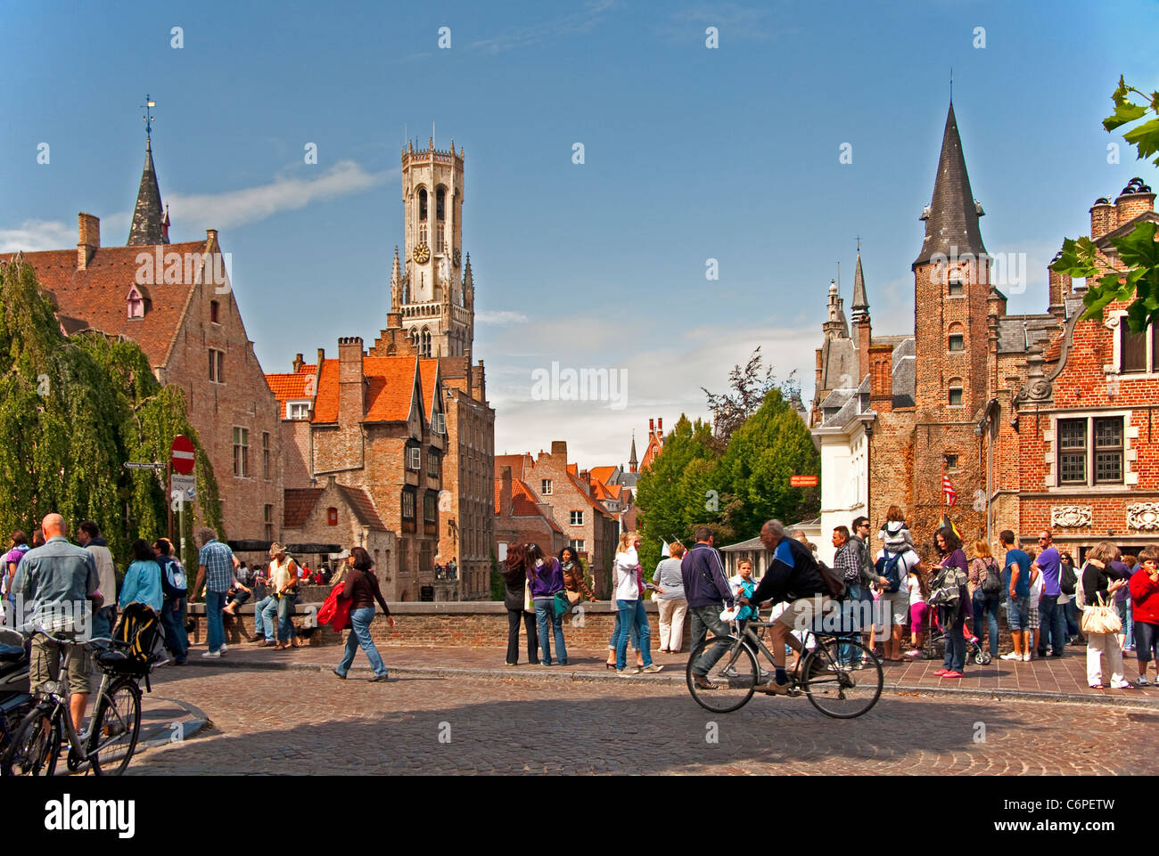 Medieval architecture of Bruges (Brugge) is dominated by the Belfort (belfry tower) as seen along Dijver in city's historic cntr Stock Photo