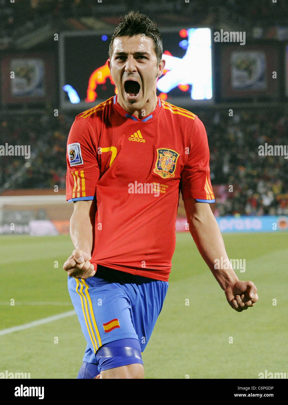 Spain striker David Villa celebrates after scoring the opening goal