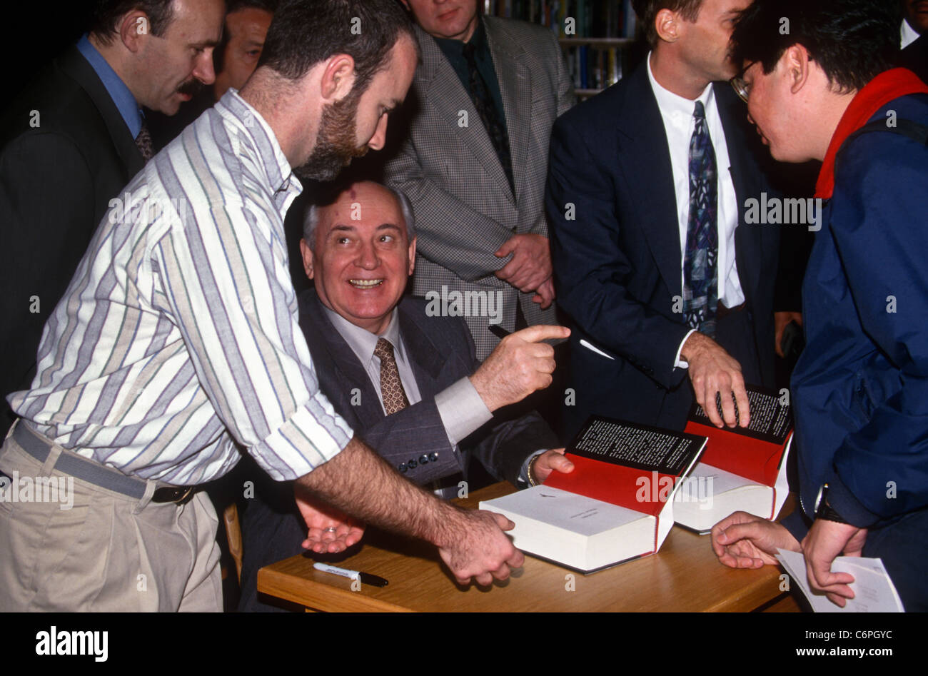 Former Soviet President Mikhail Gorbachev, with his distinctive port-wine stain on his head, smiles as he signs copies of his new autobiography 'Memoirs' at Borders Books & Music, October 25, 1996 in Washington, D.C. Stock Photo