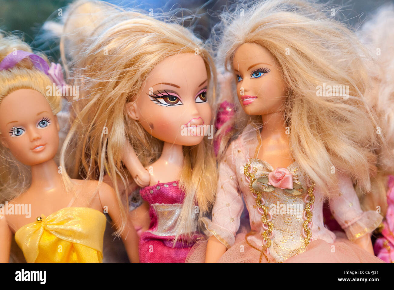 Barbie and Bratz dolls together Stock Photo
