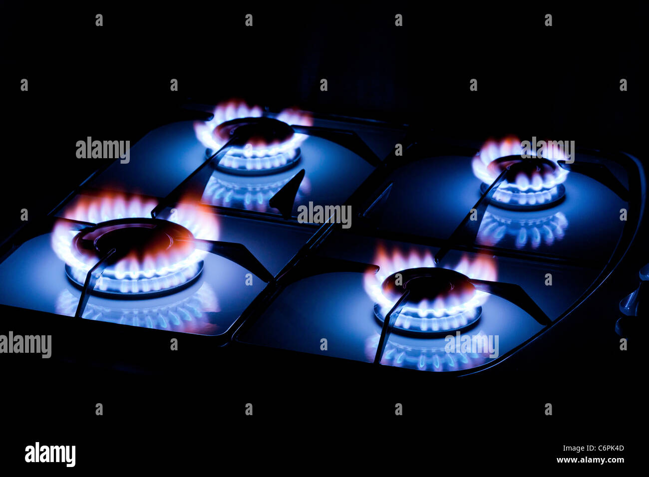 gas flames on a cooker rings Stock Photo
