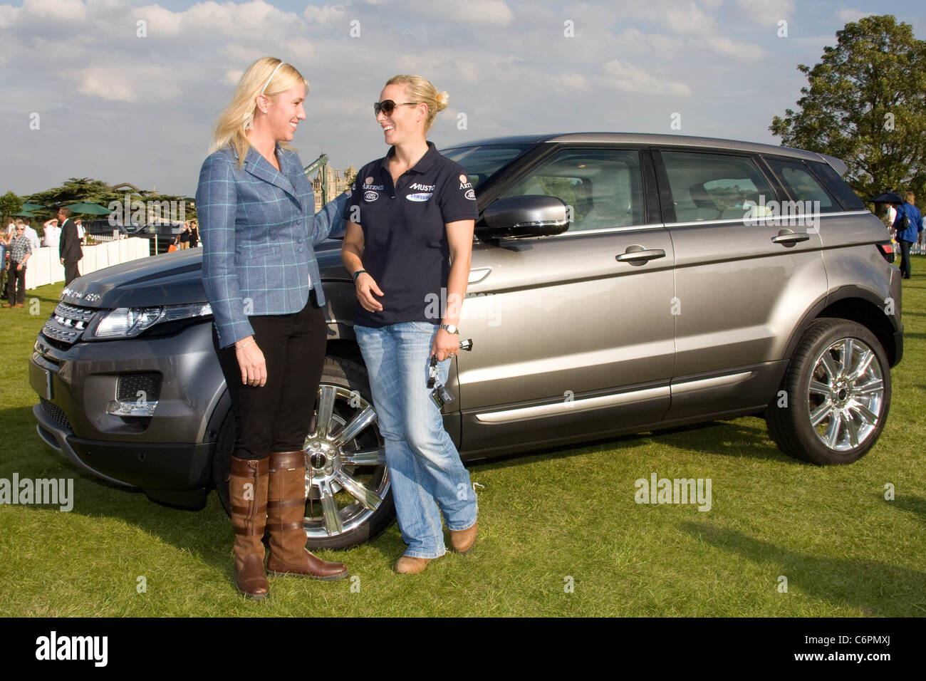 Zara Phillips takes delivery of a new Range Rover Evoke at The 2011 Land  Rover Burghley Horse Trials,Stamford,Lincolnshire from Laura Schwab of Land  Rover UK Stock Photo - Alamy